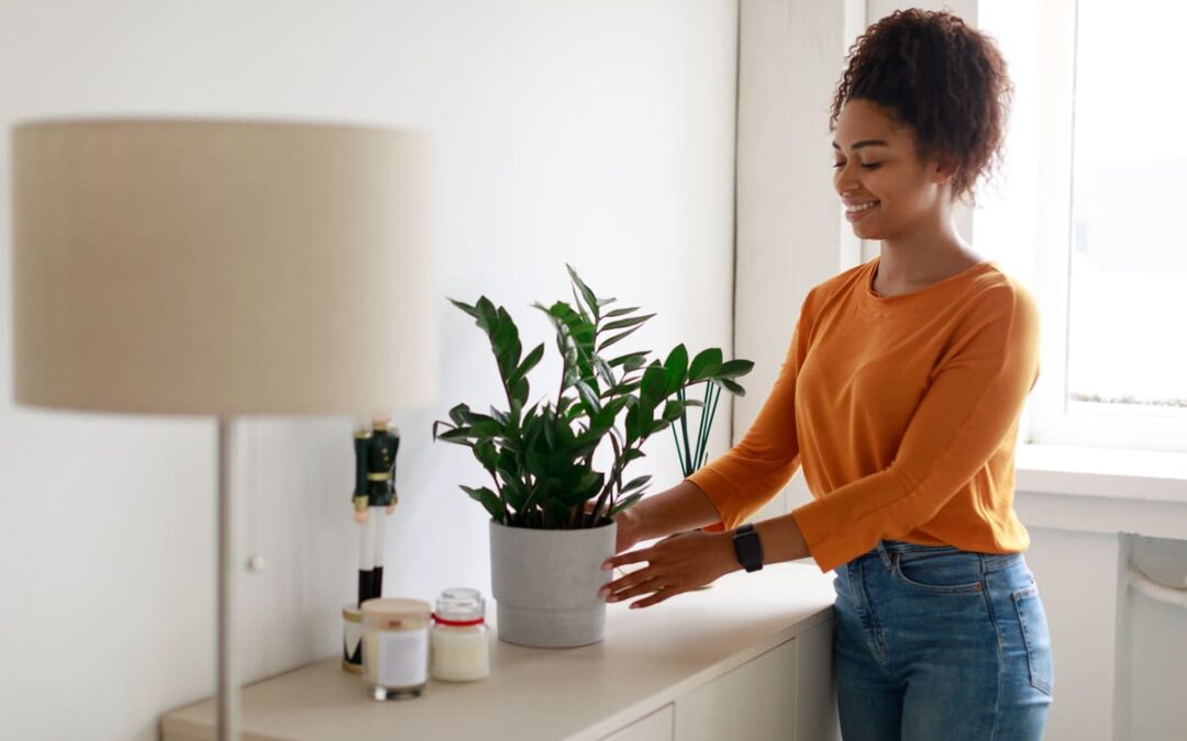 woman moving plant