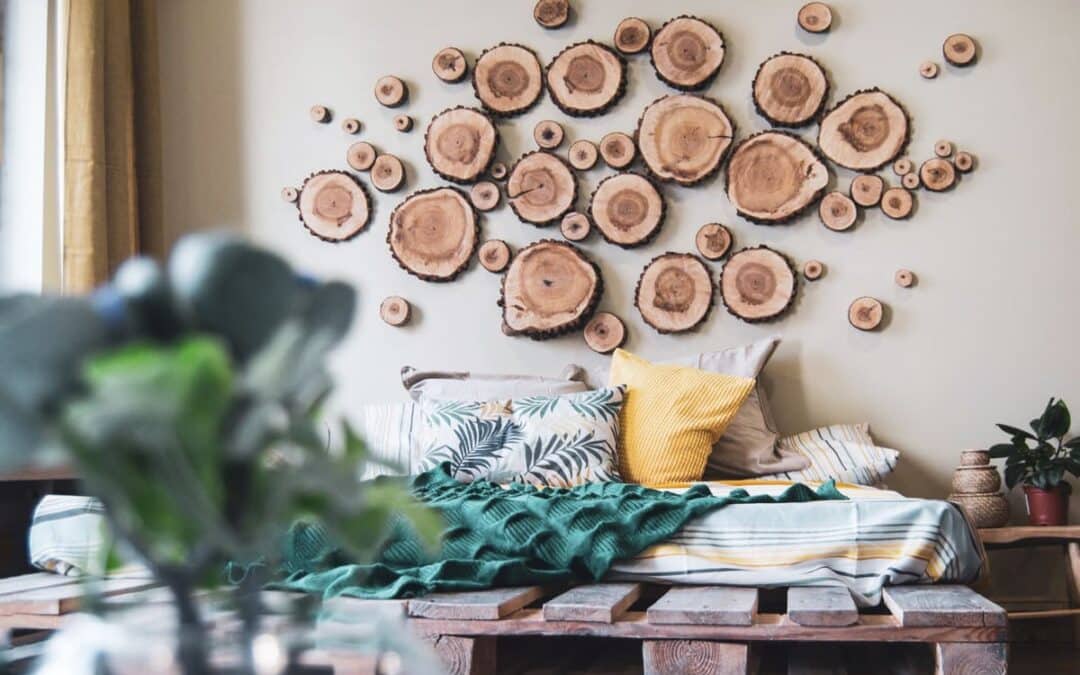 wood rounds hanging on wall behind couch